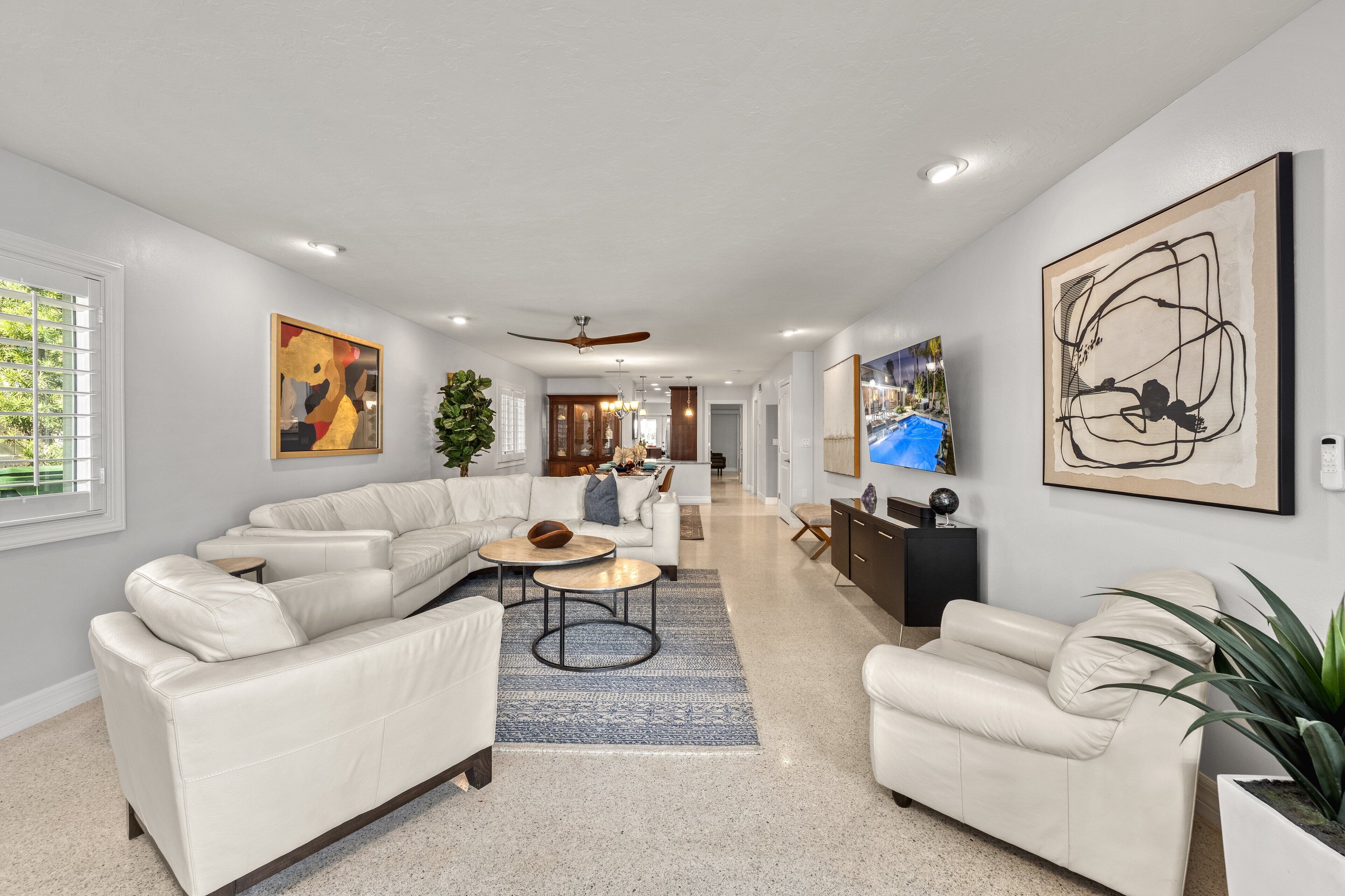 From the bright living room to the dining area and kitchen, giving the whole space a breezy, connected feel.