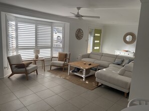 Living area - Beachy family home with just a walk to the beach or a 5 minute drive into Noosa. (Sunrise Beach)