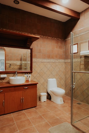 Shower, jetted bath, towels, soap
