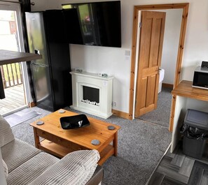 Fernseher, Kamin