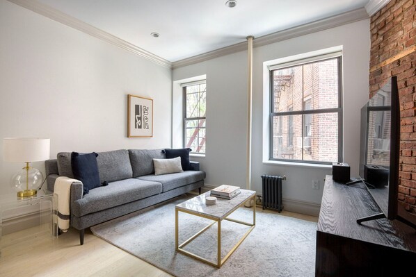 TV, stereo - Stellar West Village 1BR w/ Gym & Doorman, nr Park, by Blueground (Downtown)