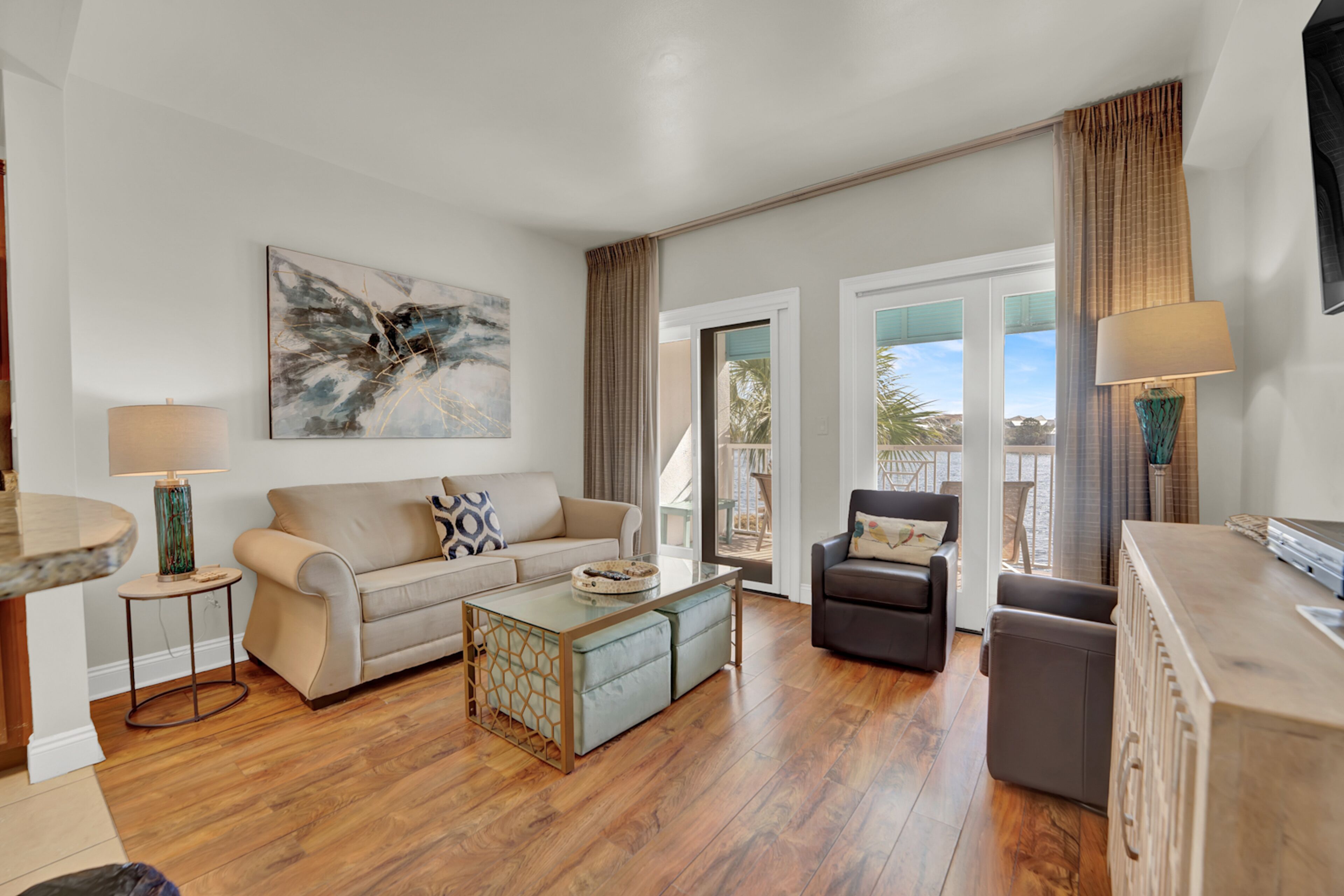 Stunning lake-view condo with private balcony, pools, hot tub, & private beach