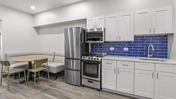 Standard Suite, Multiple Beds, Non Smoking (Premium Suite - ADA) | Private kitchen | Full-size fridge, microwave, freezer, dining tables