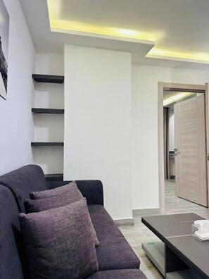 Departamento, 1 habitación, con acceso para personas discapacitadas, vista a la ciudad | Sala de estar