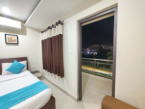 Deluxe Double Room, Multiple Bedrooms, City View | Balcony - Goroomgo Hotel Shivangi Puri (Puri)