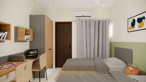 A modern hotel room with a desk, two beds, a wardrobe, and a bathroom door.