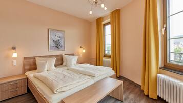 Literie hypoallergénique, minibar, coffres-forts dans les chambres