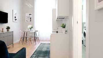 Basic Apartment, Multiple Beds | Living area | TV, streaming services