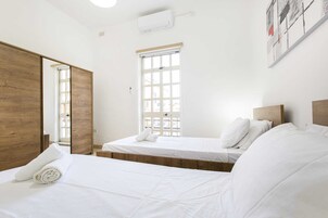 Basic Apartment, Multiple Beds | 2 bedrooms, desk, laptop workspace, iron/ironing board