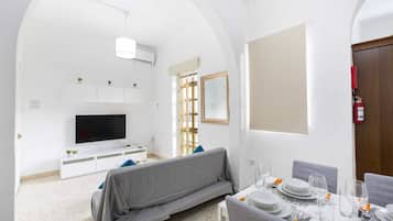 Apartamento básico, varias camas | Restauración