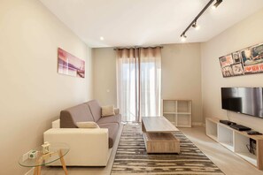 Basic Apartment, 1 Double Bed with Sofa bed | Living area | TV - Brand new 1BR in Central Malta (Pieta)