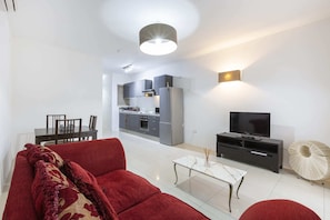 Basic Apartment, Multiple Beds | Living area