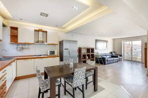Basic Apartment, Multiple Beds | Private kitchen | Fridge, microwave, oven, stovetop - Seafront Apartment (Pieta)