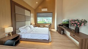 Superior Bungalow, Bathtub, Garden View | Premium bedding, minibar (some free items), desk, laptop workspace - Odyssey Hostel, Tours & Motorbikes Rental (Ha Giang 1)