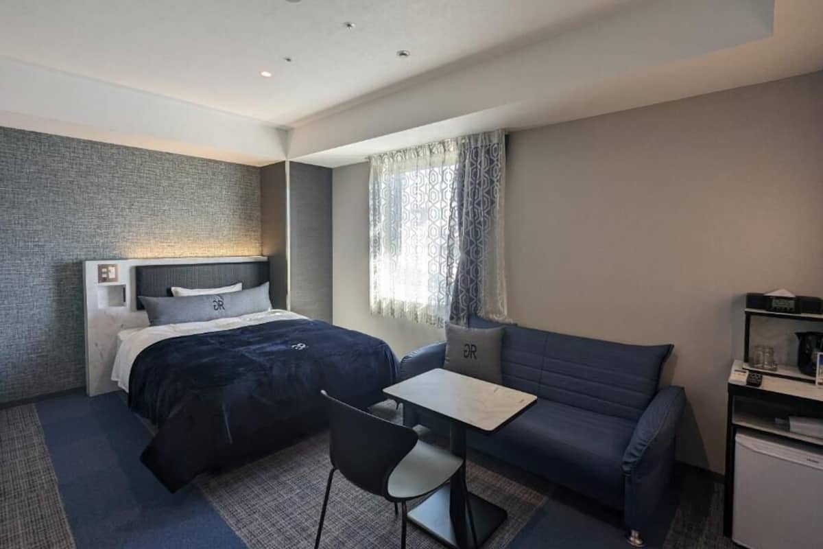 Chambre familiale double | Couette en duvet, literie fournie