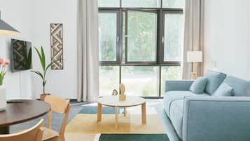 XL Apartment | Living area | 50-inch Smart TV with digital channels, TV