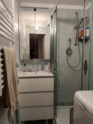 Shower, hair dryer, soap, shampoo
