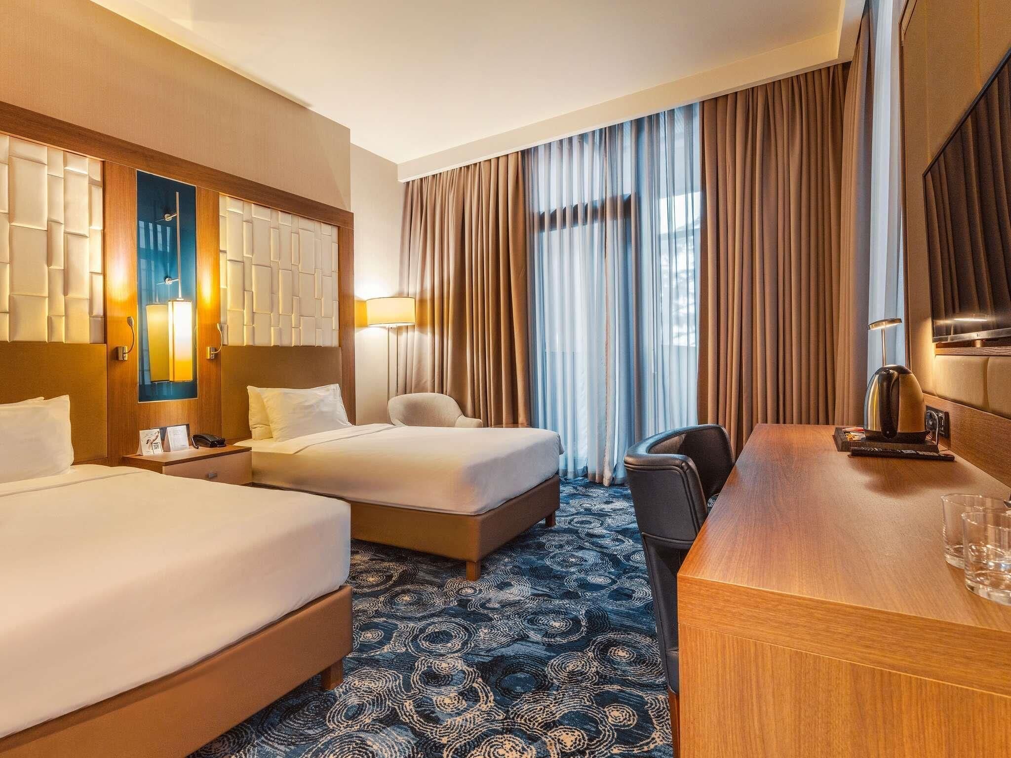 Standard Room, 2 Single Beds, Balcony | In-room safe, desk, laptop workspace, blackout curtains