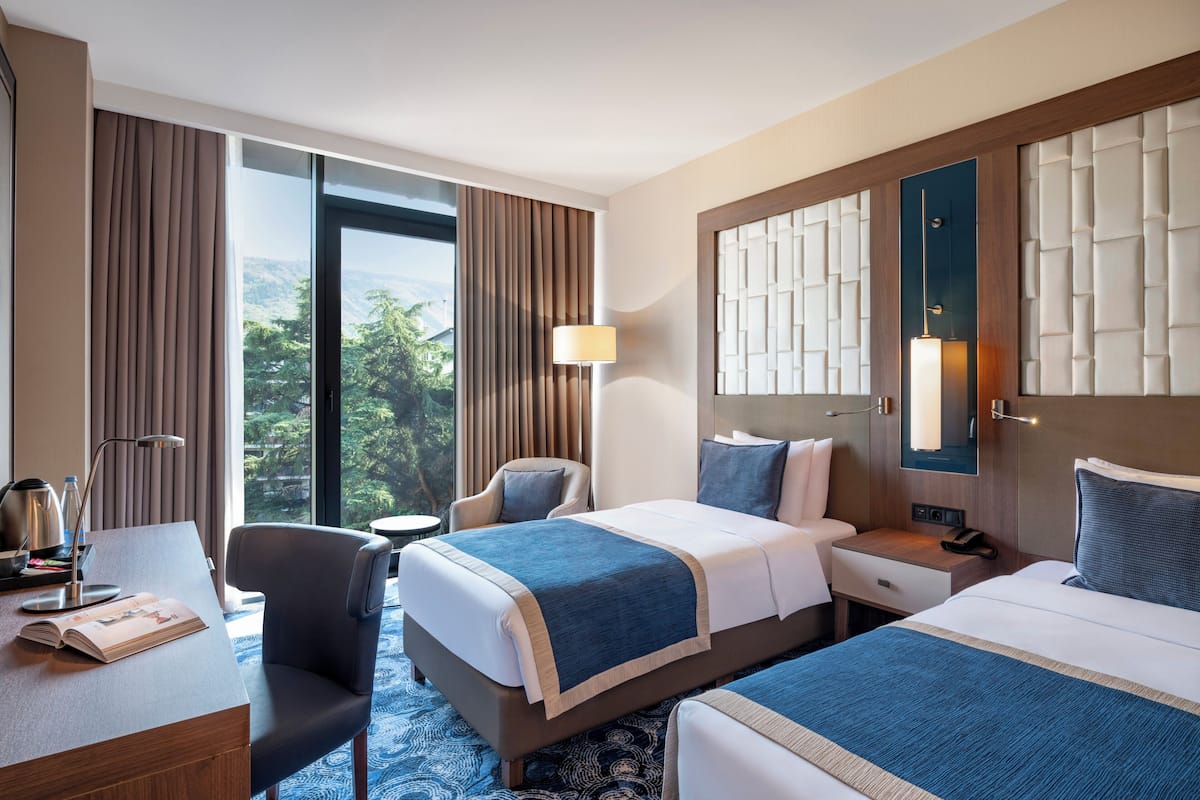 In-room safe, desk, laptop workspace, blackout curtains