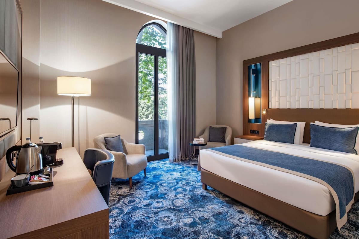 In-room safe, desk, laptop workspace, blackout curtains