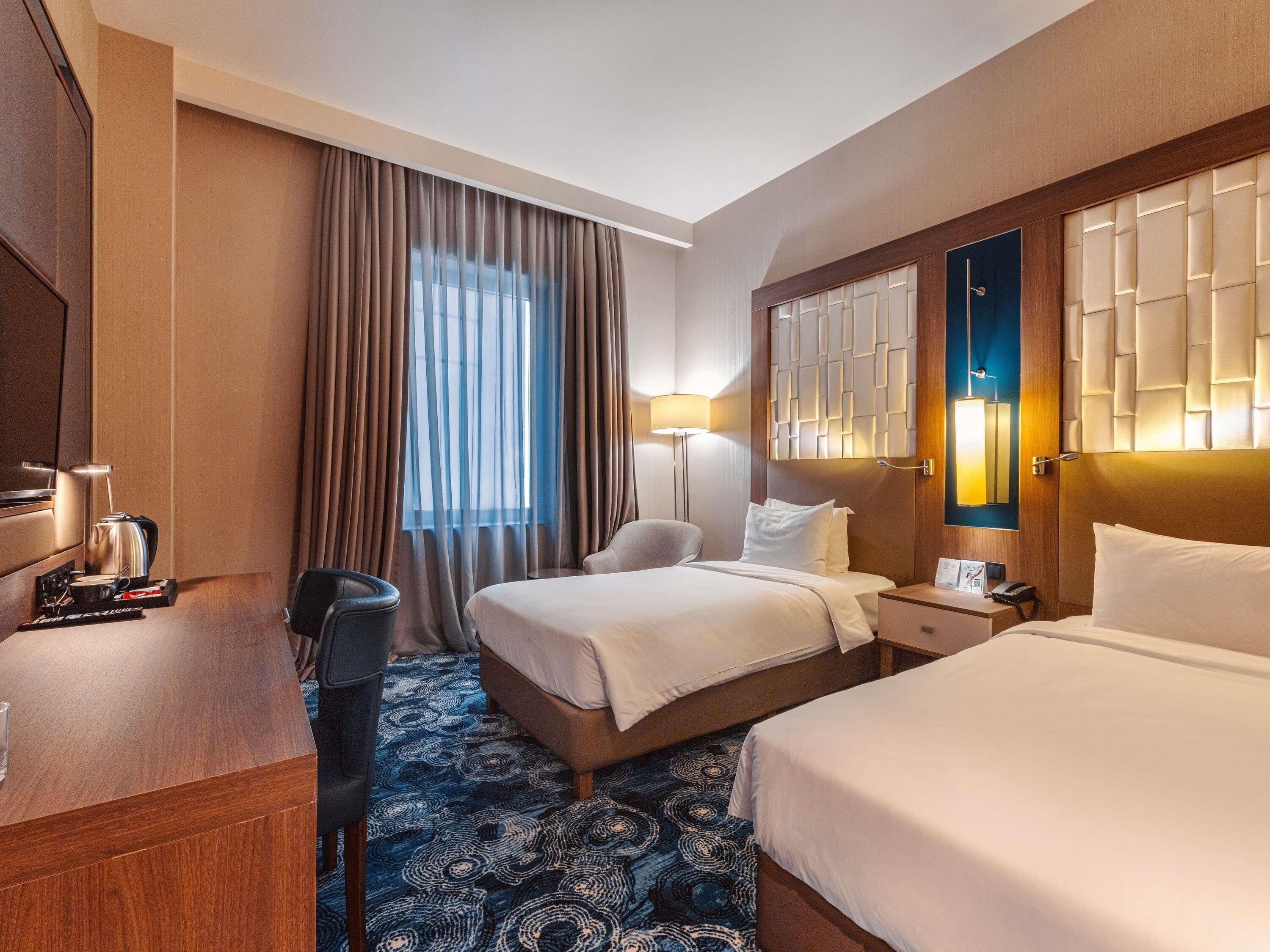 Classic Room, 2 Single Beds | In-room safe, desk, laptop workspace, blackout curtains