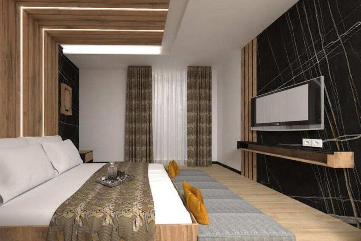 Deluxe Room | 1 bedroom, desk, laptop workspace, free WiFi