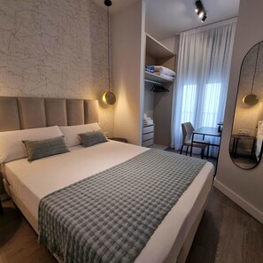 2 habitaciones, tabla de planchar con plancha, cuna de viaje y wifi 
