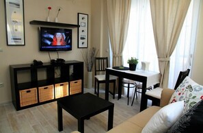 Suite Deluxe | Caja de seguridad en la habitación, wifi gratis y ropa de cama 