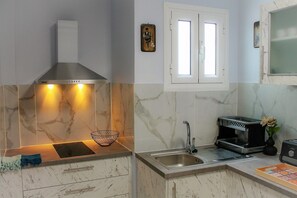 Fridge, electric kettle, toaster, highchair