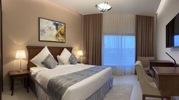 Premium bedding, pillowtop beds, minibar, in-room safe