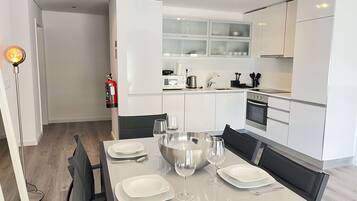 Apartment | Private kitchen | Full-size fridge, microwave, oven, stovetop