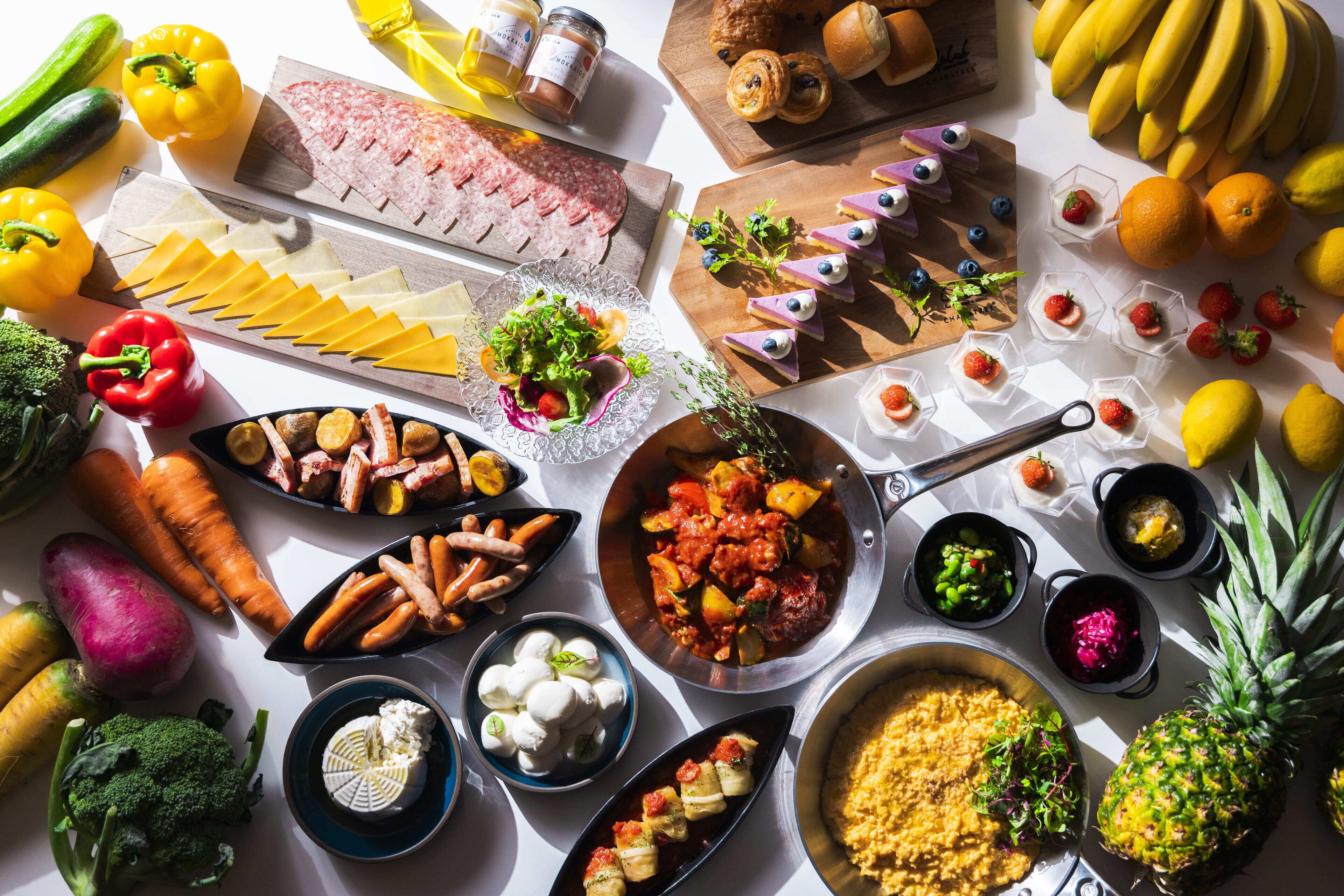 A variety of food items and condiments arranged on a table.