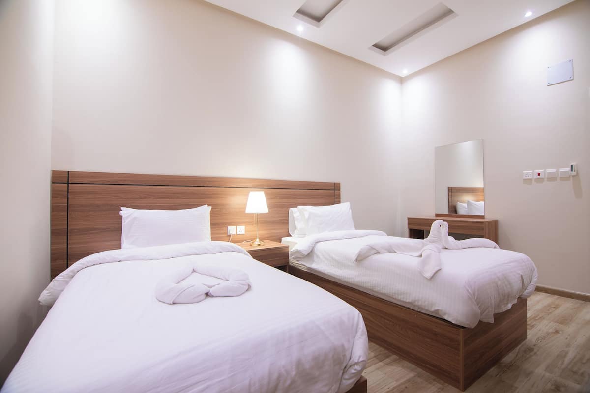 Habitación cuádruple Grand | Caja de seguridad en la habitación y insonorización