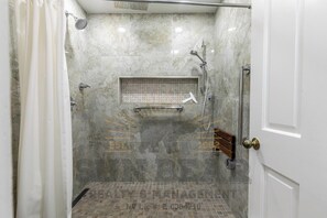 Bathtub, hair dryer, towels