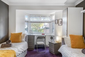 4 bedrooms, desk, iron/ironing board, travel cot