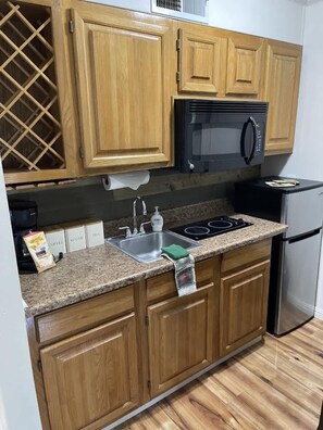 Fridge, microwave, stovetop, coffee/tea maker - Blue Spruce Condo #134 (Ruidoso)