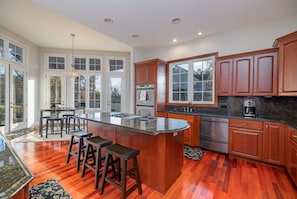 Fridge, microwave, oven, stovetop - Portside Villa Luxury Rental on Lake Gaston (Bracey)