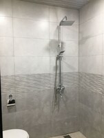 Standard Room, 1 Double Bed | Bathroom | Shower, rainfall showerhead, designer toiletries, slippers