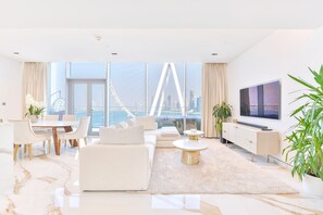 Panoramic Apartment, 2 Bedrooms, Balcony, Oceanfront | Living area | 75-inch LED TV with satellite channels, TV, Netflix - Lavish & Equipped 2 BR Facing Ain Dubai (Dubai)