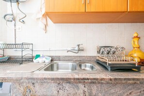 Apartment | Private kitchen | Fridge, stovetop, electric kettle