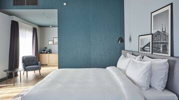Suite junior, para no fumadores | Ropa de cama hipoalergénica y caja de seguridad en la habitación