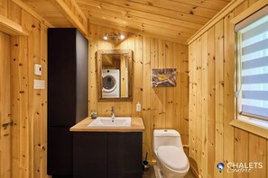 Shower, hair dryer, towels, shampoo