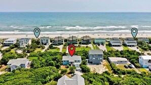 A coastal residential area with houses and a beach. - Windy Dunes, Almost Oceanfront House in Emerald Isle, NC! (Emerald Isle)