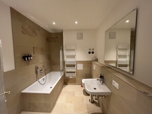 Hair dryer, towels, soap, shampoo