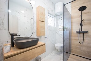Hair dryer, bidet, towels, soap
