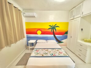 Suite Grand | Caja fuerte, escritorio, cortinas opacas y tabla de planchar con plancha