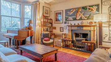 Fireplace, books, music library
