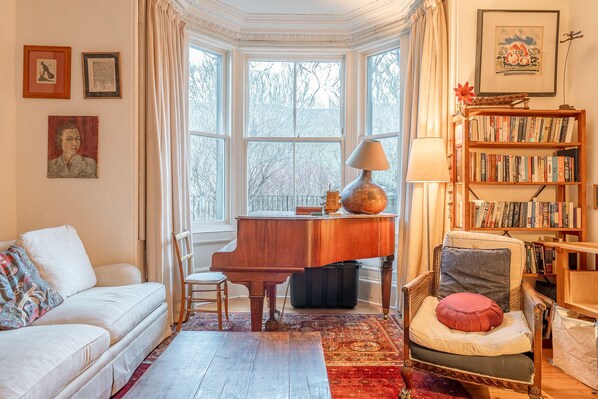 Fireplace, books, music library