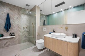 Bathtub, hair dryer, towels, soap