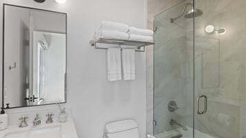 Shower, eco-friendly toiletries, hair dryer, towels